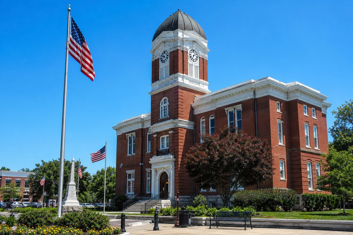 Springfield, Tennessee — historic brick courthouse with clock tower and American flag
